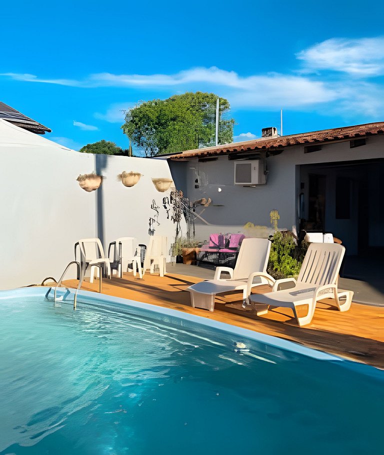 Casa com 3 suite 1qto piscina  AR para 10 hóspedes